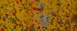 Paint splatters on yellow background